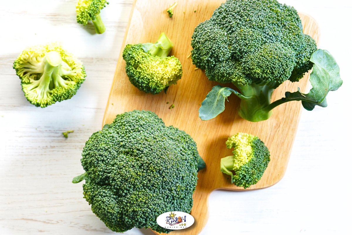 Cutting Broccoli in a chopping board